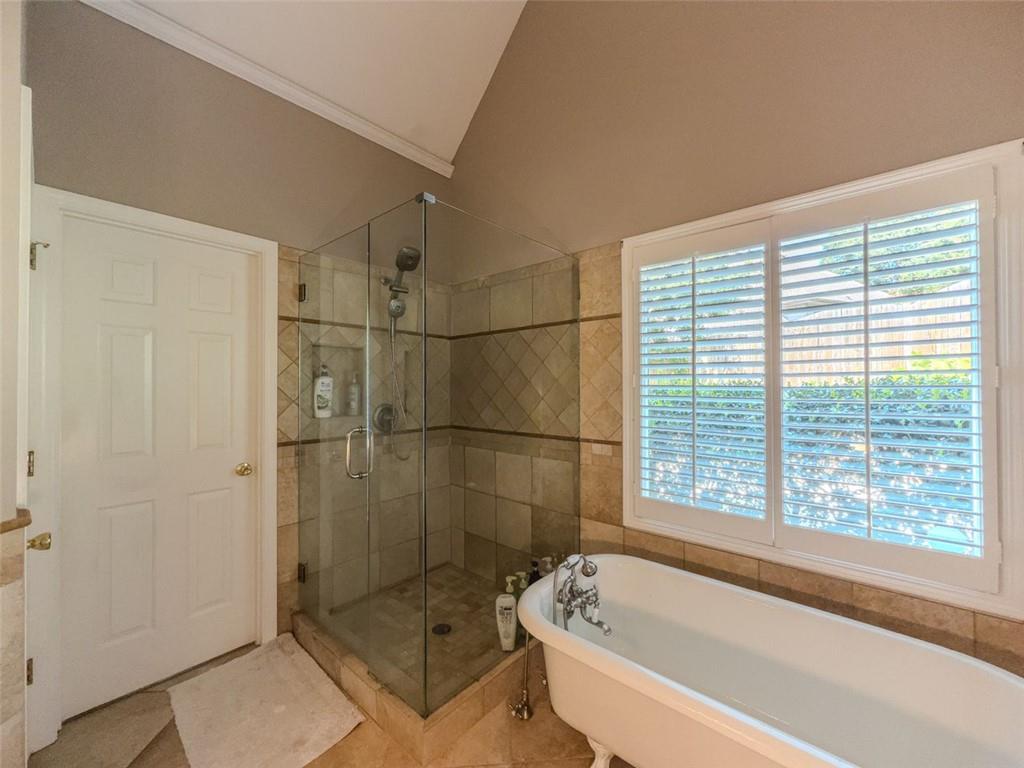 1739 Praters Point Dacula, GA 30019 - Photo 21 of 48 a bathroom with a bathtub and shower