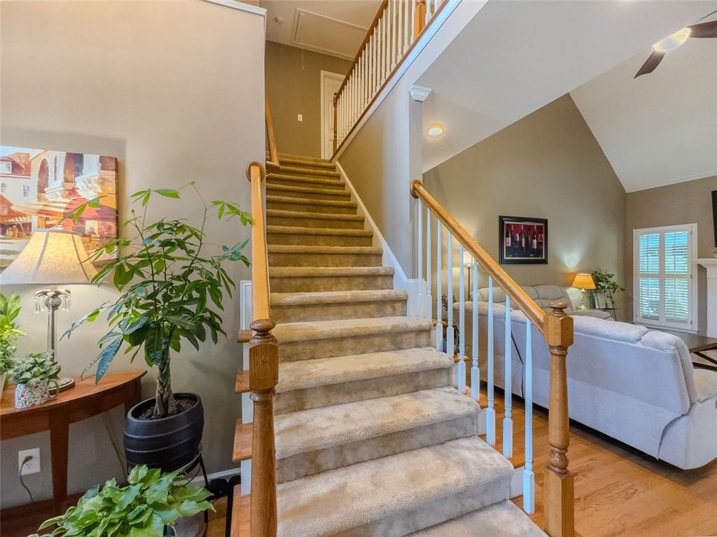 1739 Praters Point Dacula, GA 30019 - Photo 23 of 48 a living room with furniture and a potted plant