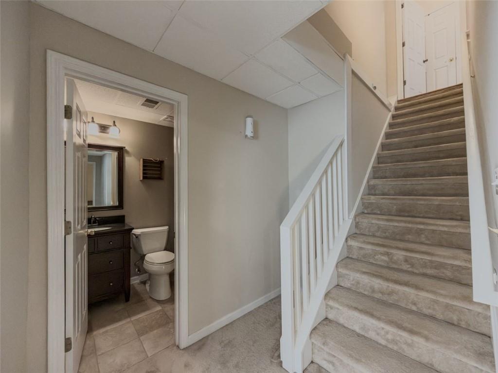 1739 Praters Point Dacula, GA 30019 - Photo 31 of 48 a view of a bathroom with toilet and a sink