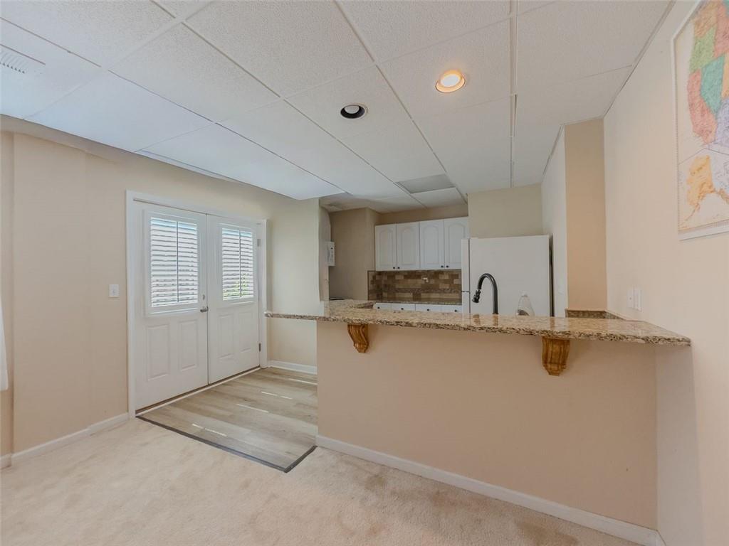 1739 Praters Point Dacula, GA 30019 - Photo 34 of 48 a view of a kitchen with a sink