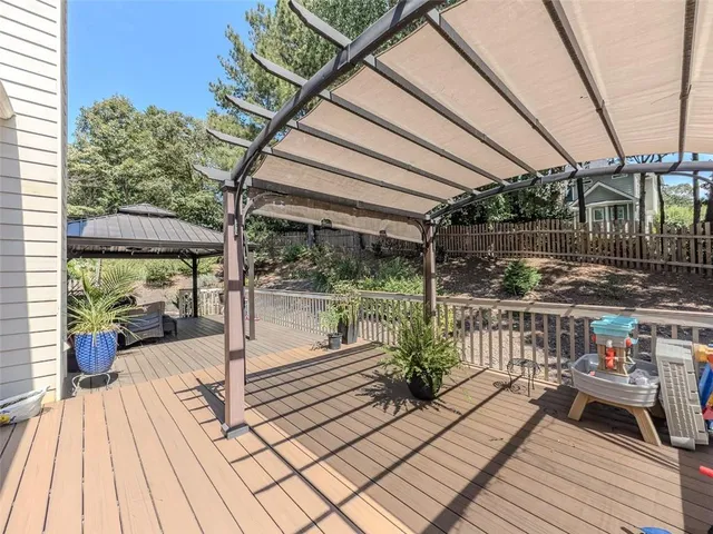 a view of a balcony with chairs