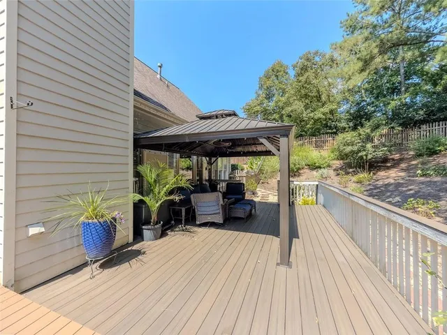 a view of a patio with wooden floor