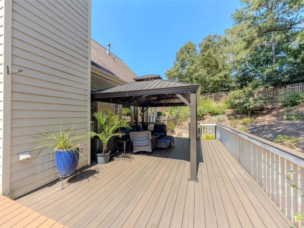 1739 Praters Point Dacula, GA 30019 - Photo 42 of 48 a view of a patio with wooden floor