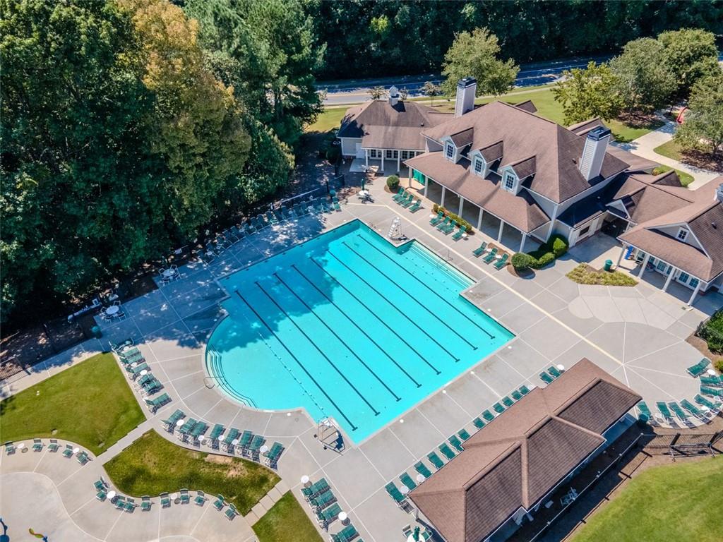 1739 Praters Point Dacula, GA 30019 - Photo 48 of 48 an aerial view of a house with a swimming pool and outdoor seating