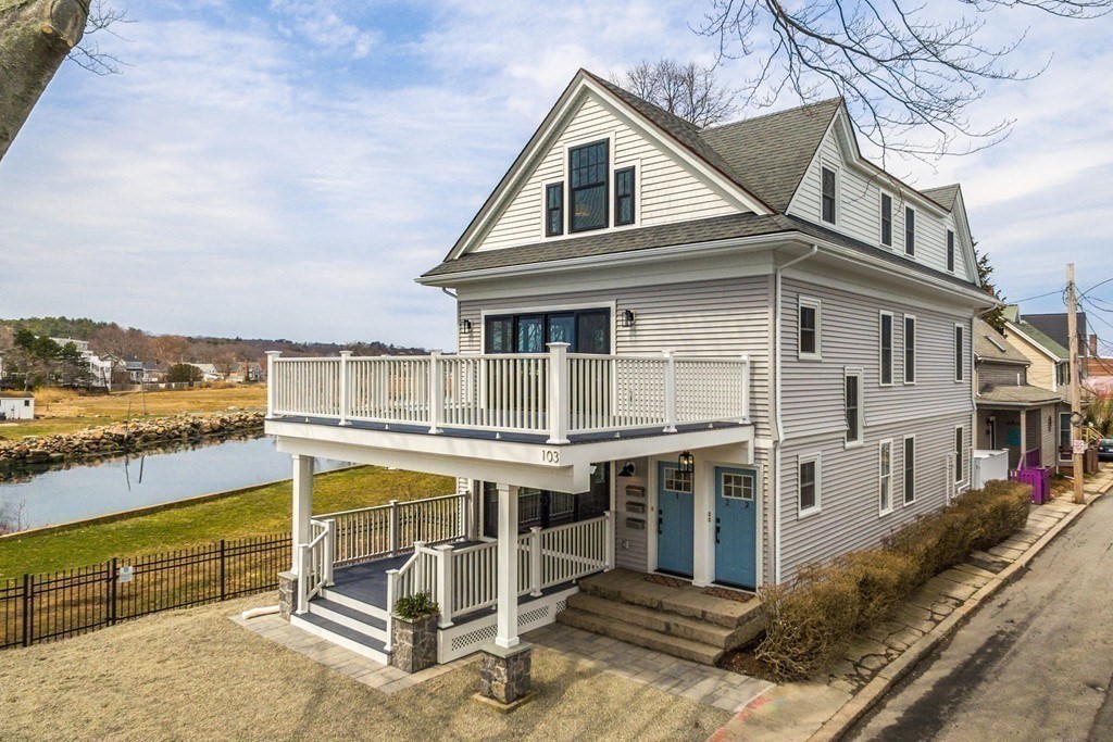 a view of a house with a ocean view