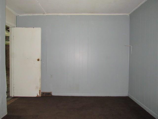 428 Grindstone Road Grindstone, PA 15442 - Photo 11 of 15 a room with a refrigerator