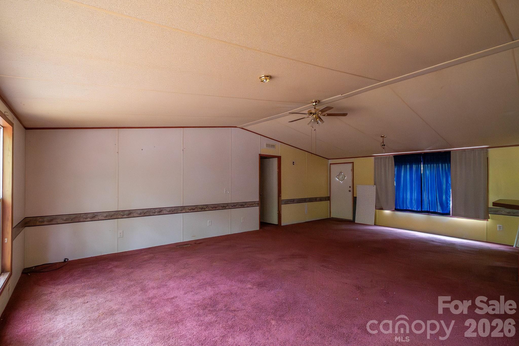 3133 Magnolia Road Bennettsville, SC 29512 - Photo 6 of 41 a view of a livingroom with a staircase