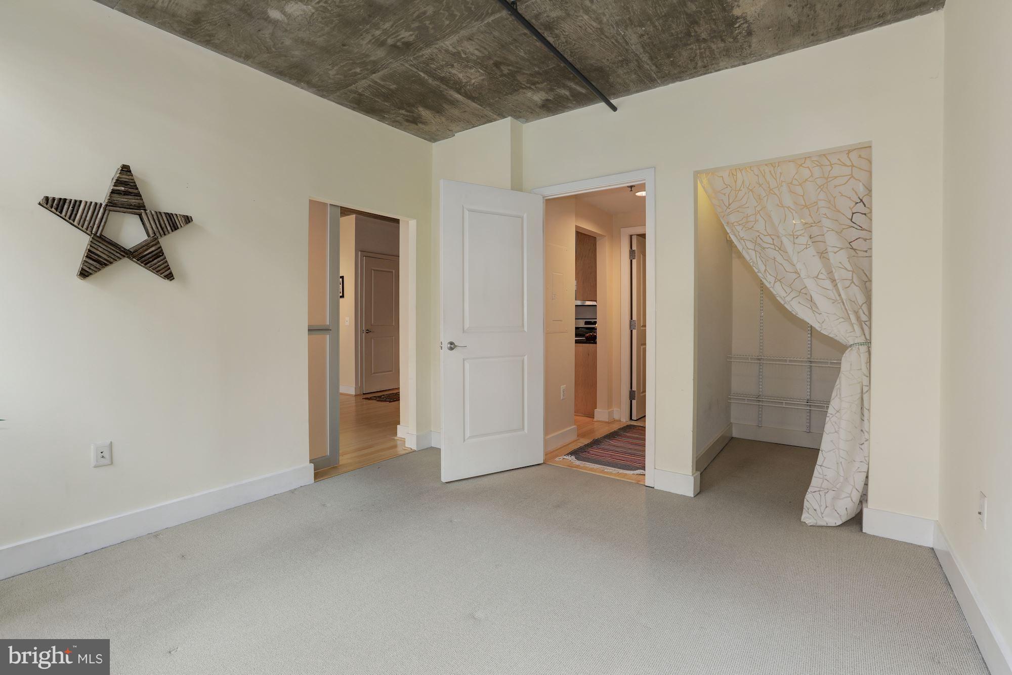 1444 Church Street Northwest, Unit 206 Washington, DC 20005 - Photo 12 of 22 a view of hallway with stairs