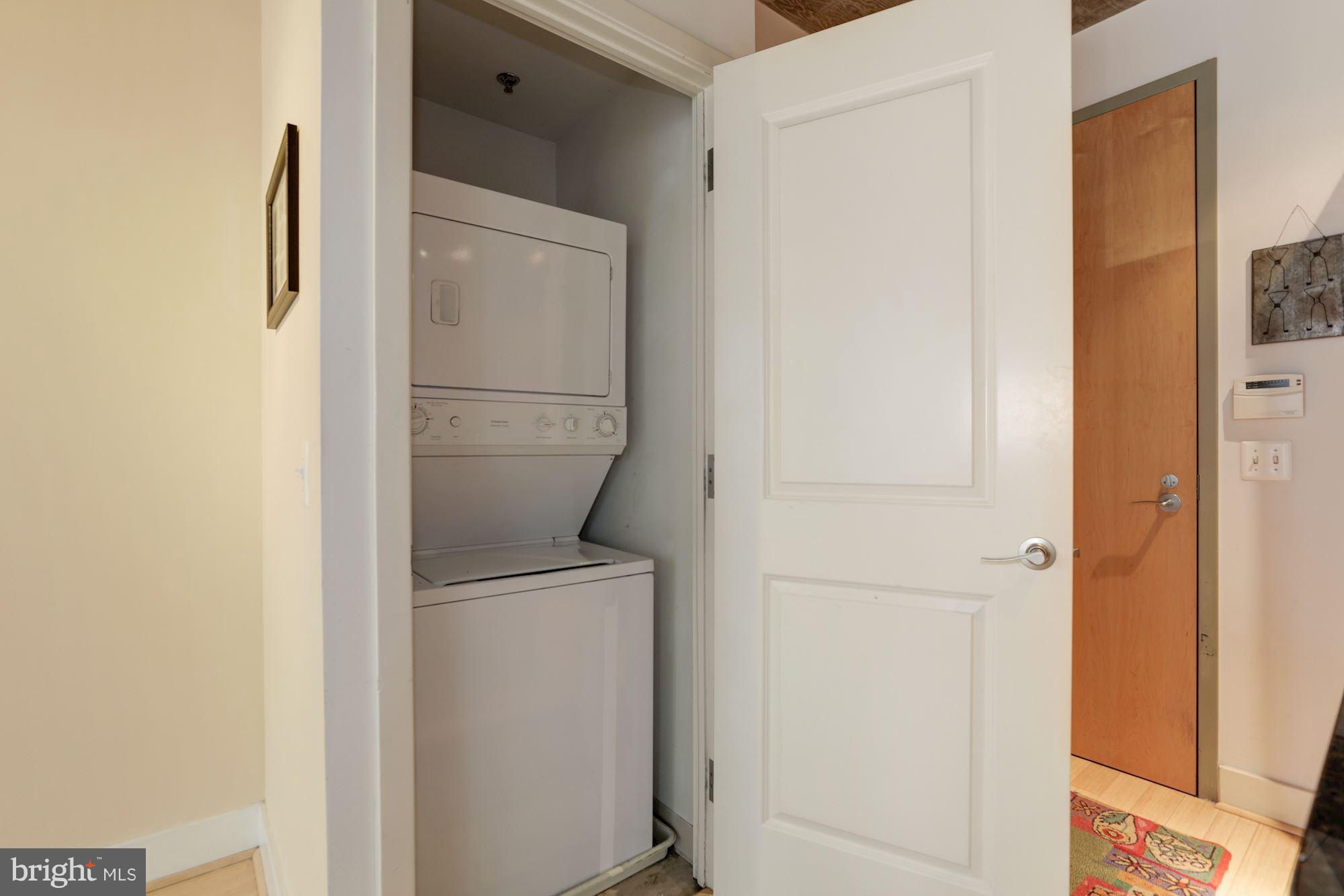 1444 Church Street Northwest, Unit 206 Washington, DC 20005 - Photo 15 of 22 a bathroom with a toilet and a refrigerator