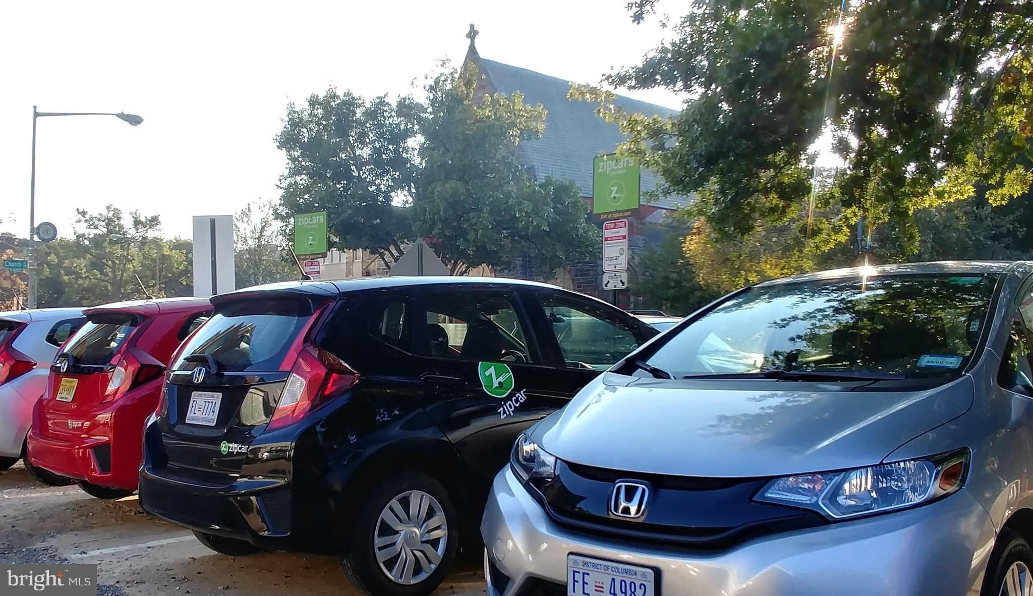 1444 Church Street Northwest, Unit 206 Washington, DC 20005 - Photo 20 of 22 a front view of a house with car parked
