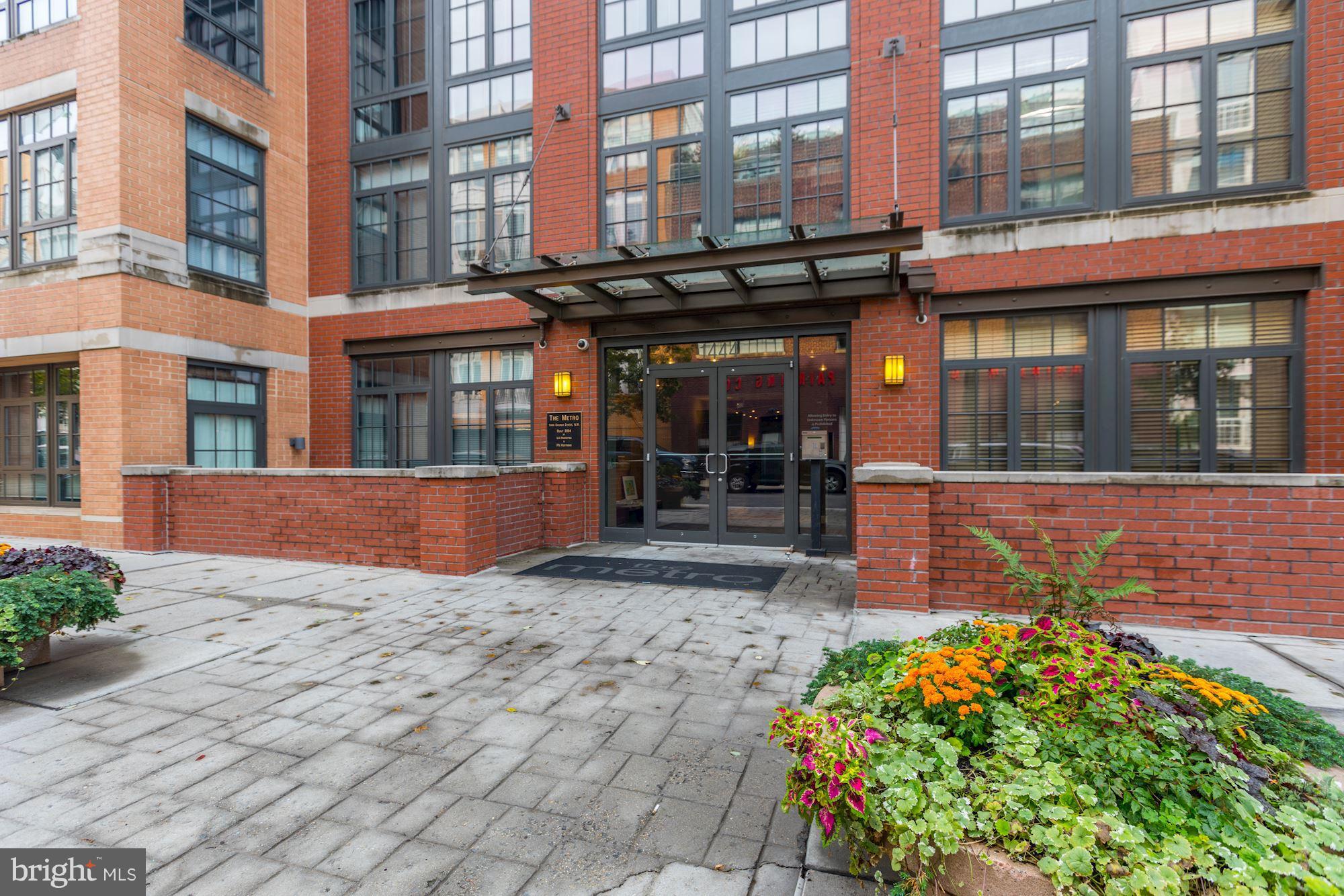 1444 Church Street Northwest, Unit 206 Washington, DC 20005 - Photo 3 of 22 a view of a building with brick walls