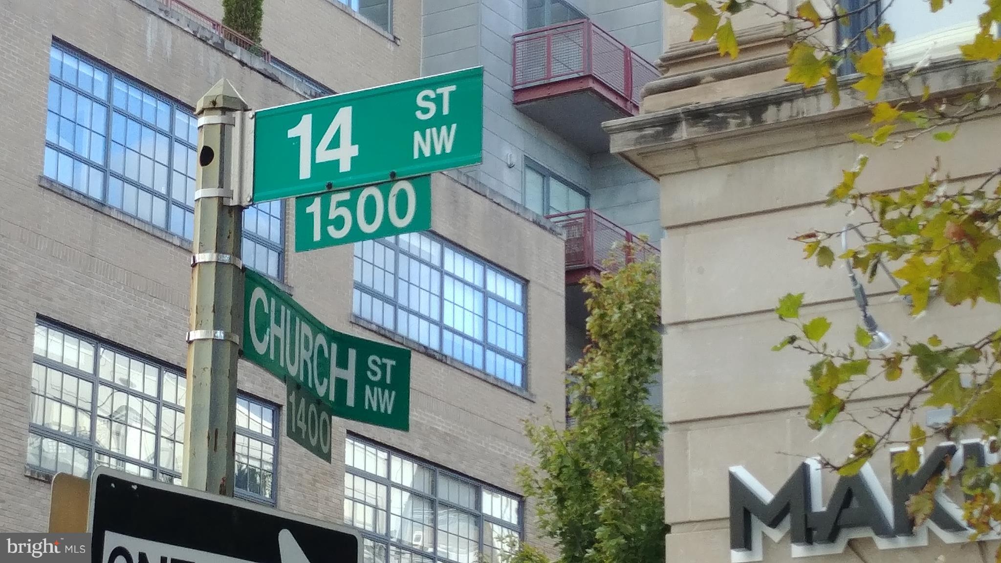 1444 Church Street Northwest, Unit 206 Washington, DC 20005 - Photo 21 of 22 a sign that is on a pole