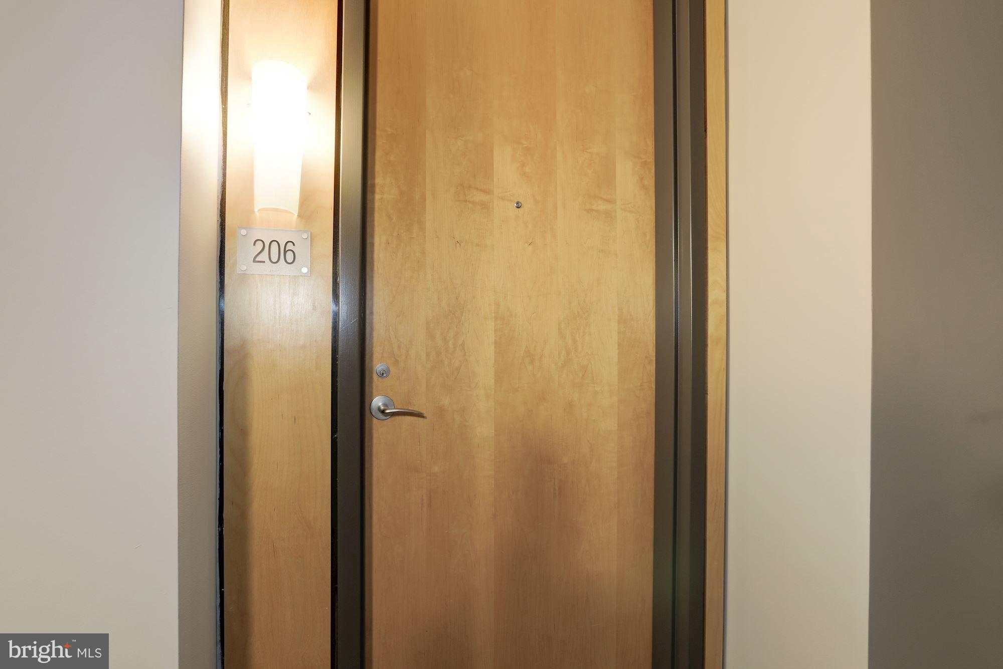 1444 Church Street Northwest, Unit 206 Washington, DC 20005 - Photo 4 of 22 a bathroom with a glass shower door