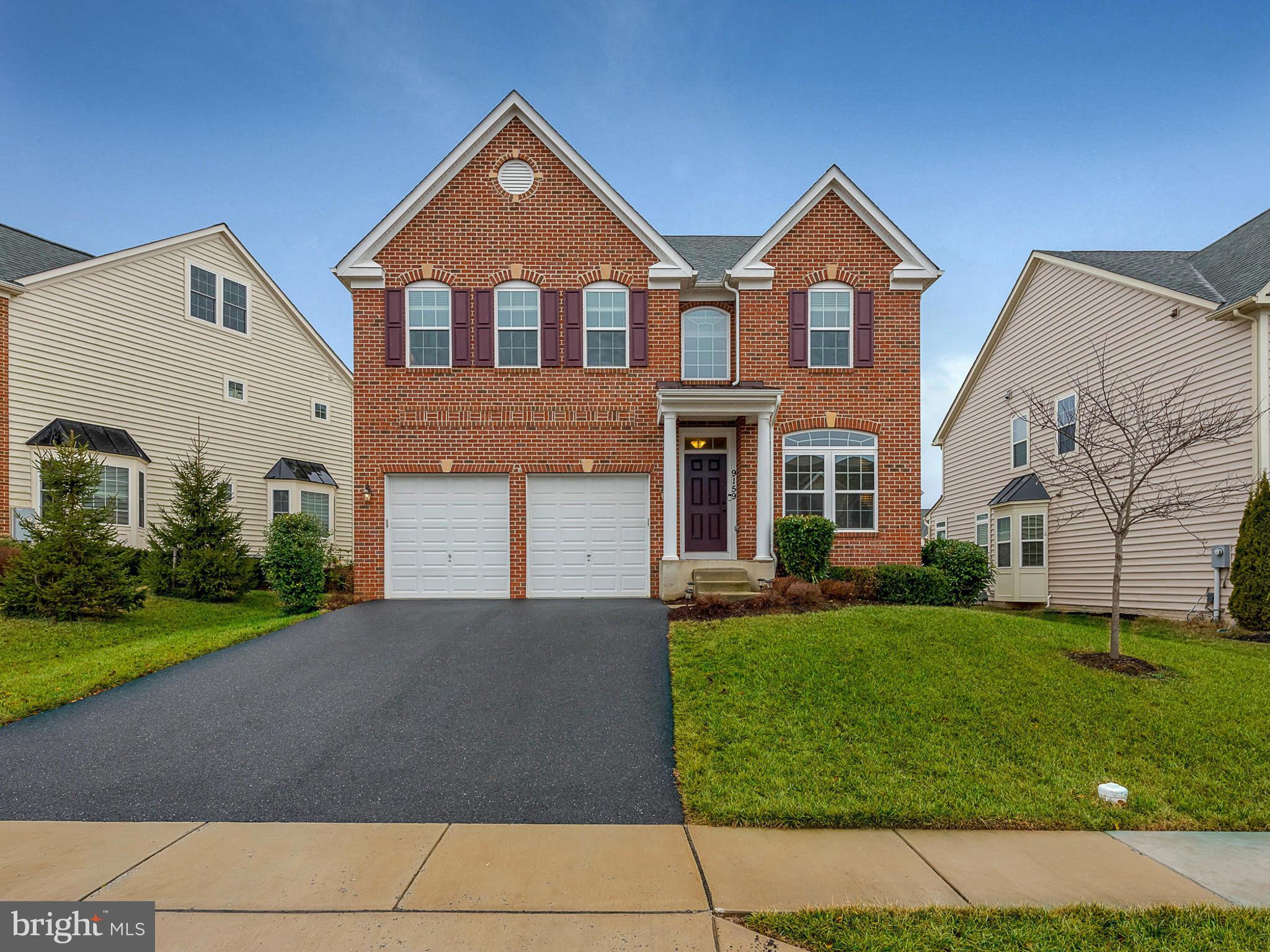 Lovely brick front home in the Villages of Urbana!