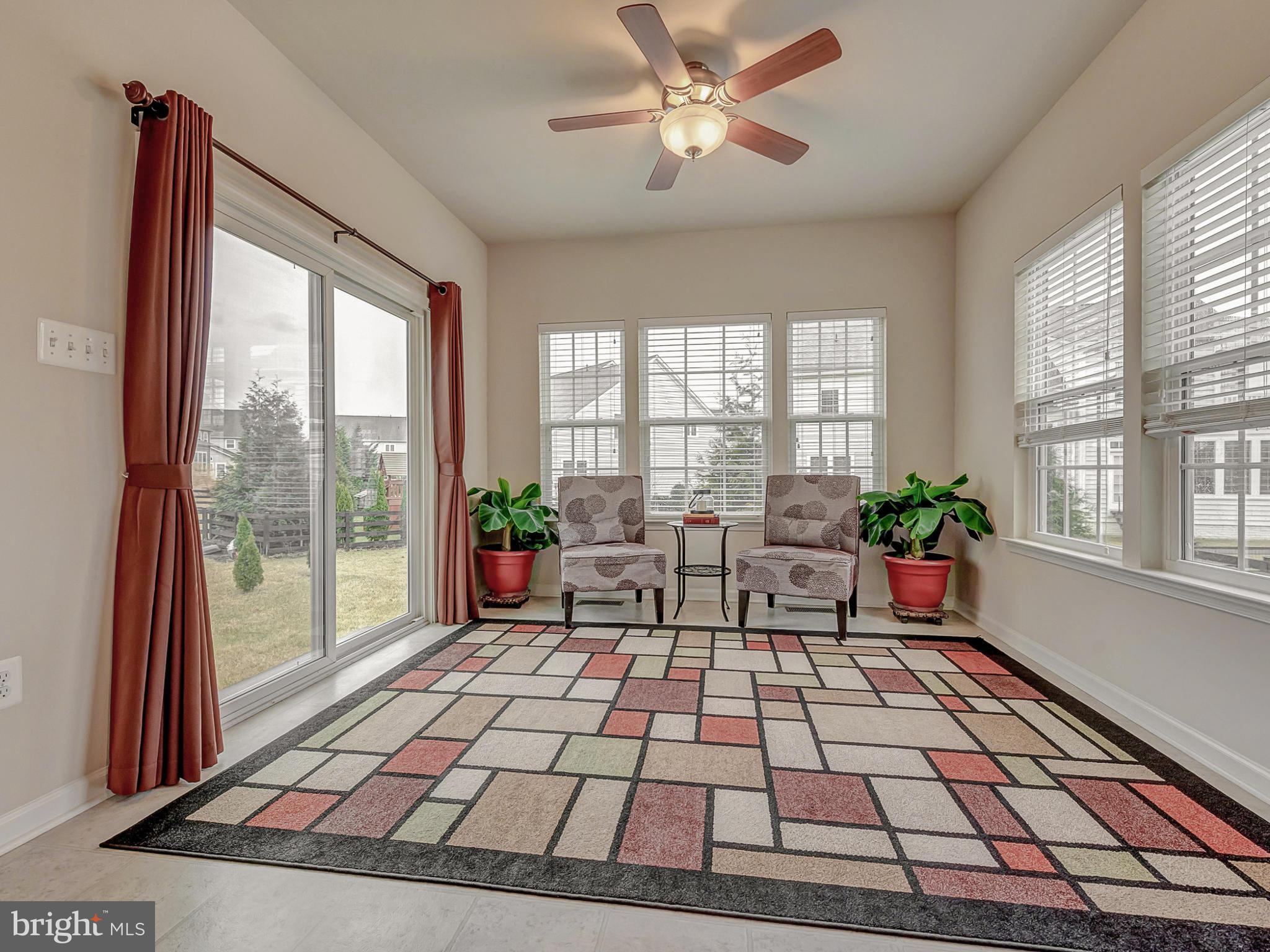 9159 Bealls Farm Road Frederick, MD 21704 - Photo 7 of 30 Large morning room opens to expansive flat yard.