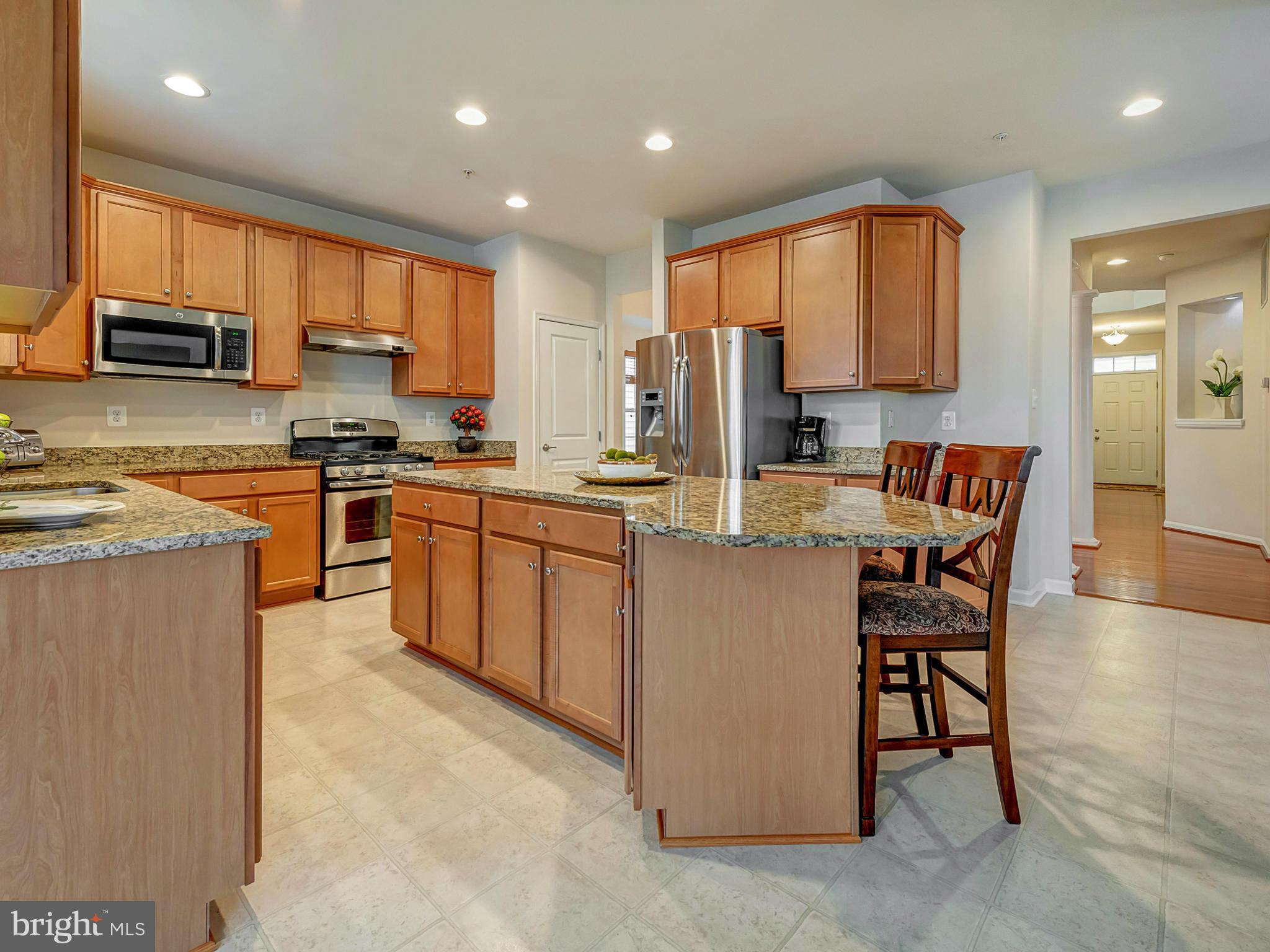 9159 Bealls Farm Road Frederick, MD 21704 - Photo 8 of 30 Kitchen features granite countertops and island.