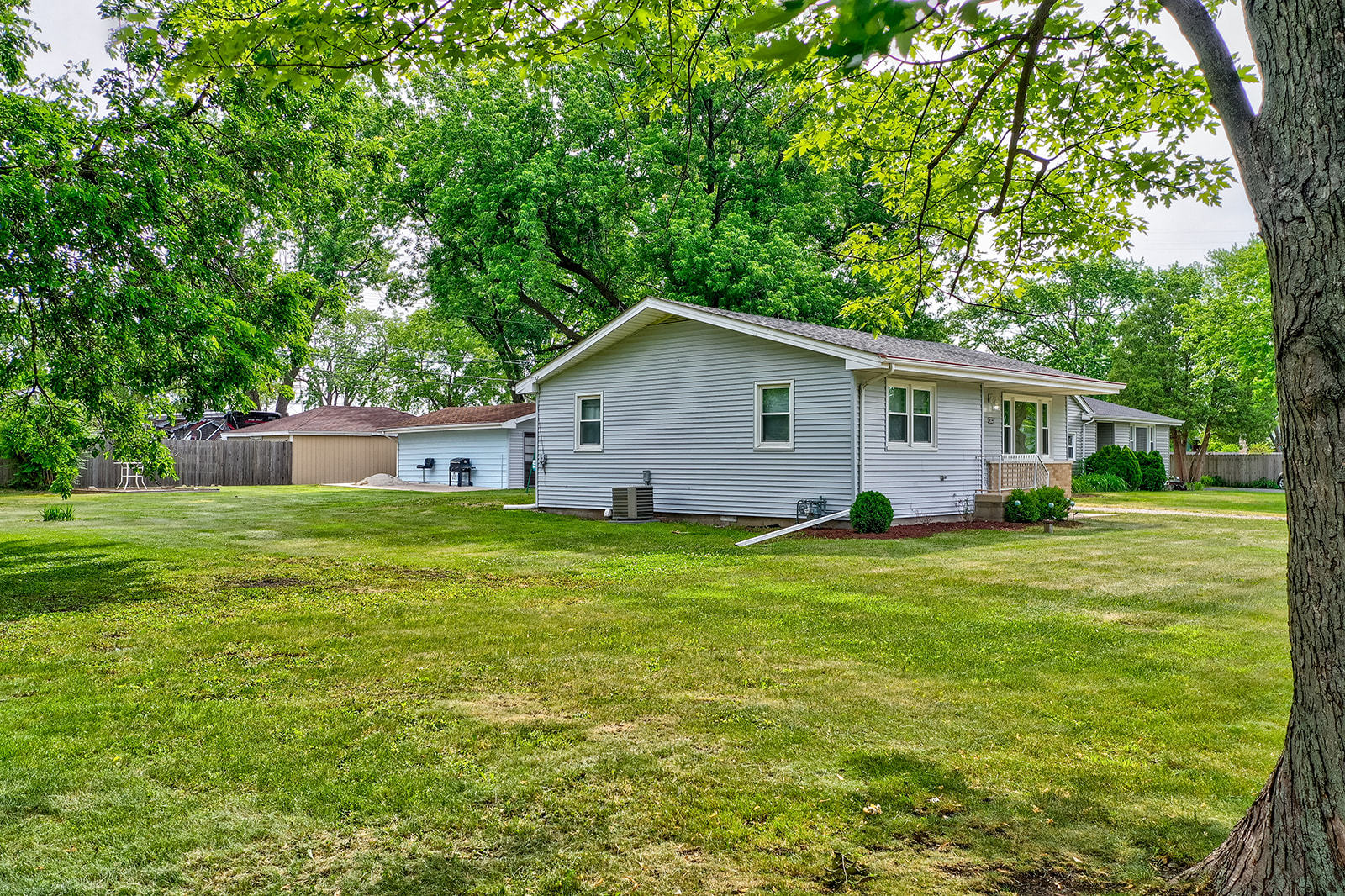 2134 Root Street Crest Hill, IL 60403 - Photo 2 of 17 a front view of house with yard and green space
