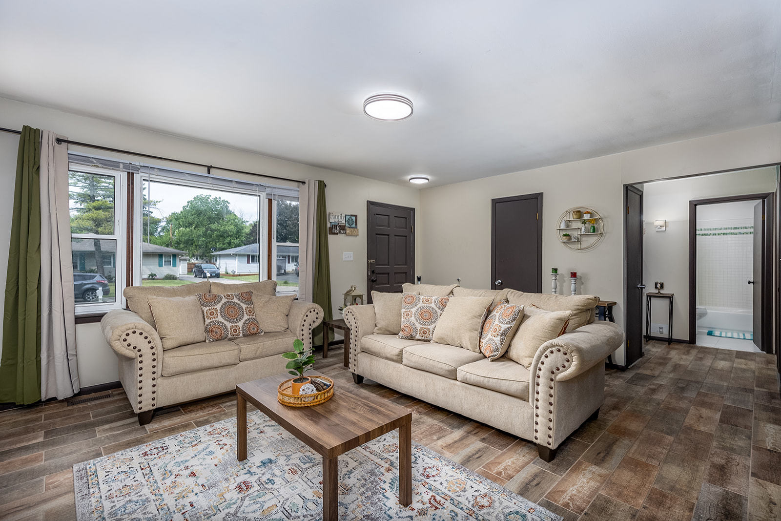 2134 Root Street Crest Hill, IL 60403 - Photo 5 of 17 a living room with furniture and a large window