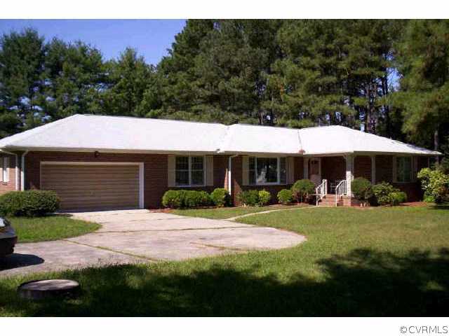 10708 South Crater Road Petersburg, VA 23805 - Photo 2 of 3 a view of a house with backyard and garden