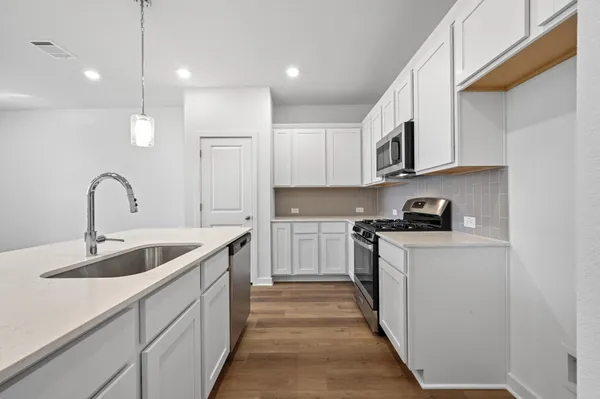 $295,000 | 497 Orleanian Drive, Unit B, Buda, TX 78610