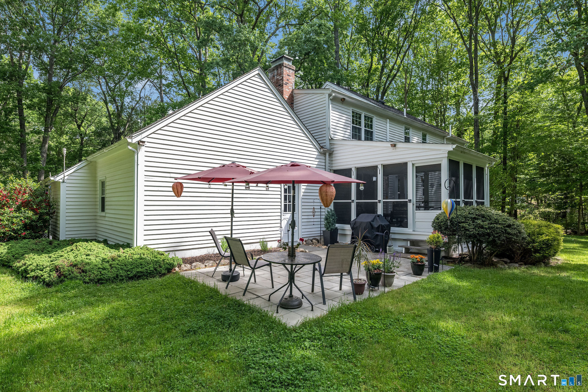 60 Bradley Corners Road Madison, CT 06443 - Photo 26 of 33 a garden view with a seating space and garden