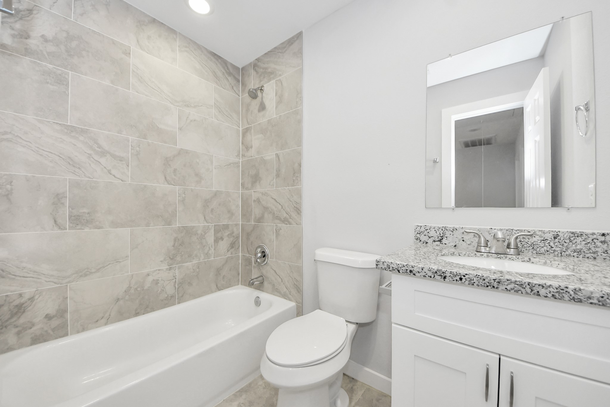6609 Bacher Street, Unit A Houston, TX 77028 - Photo 23 of 33 a bathroom with a sink a toilet and a bathtub