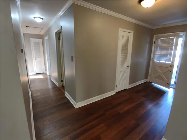 a white toilet sitting next to a bath tub