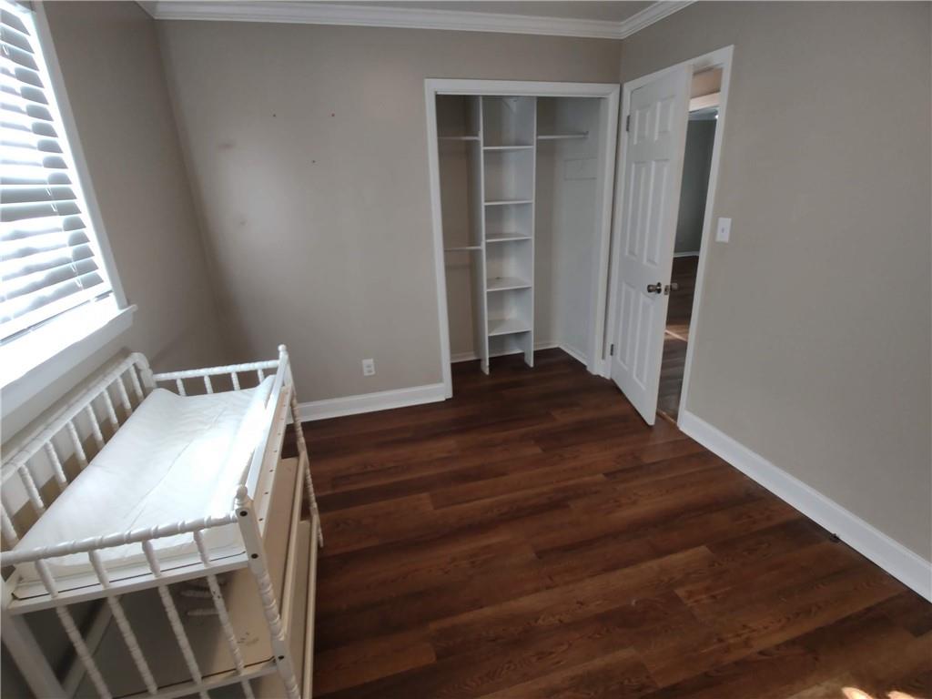 1 Westlyn Drive Rome, GA 30165 - Photo 15 of 26 a view of a hallway with wooden floor and staircase