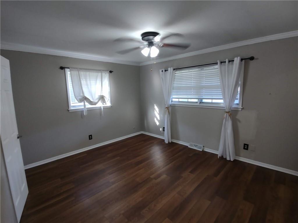 1 Westlyn Drive Rome, GA 30165 - Photo 17 of 26 a view of an empty room with wooden floor and a window
