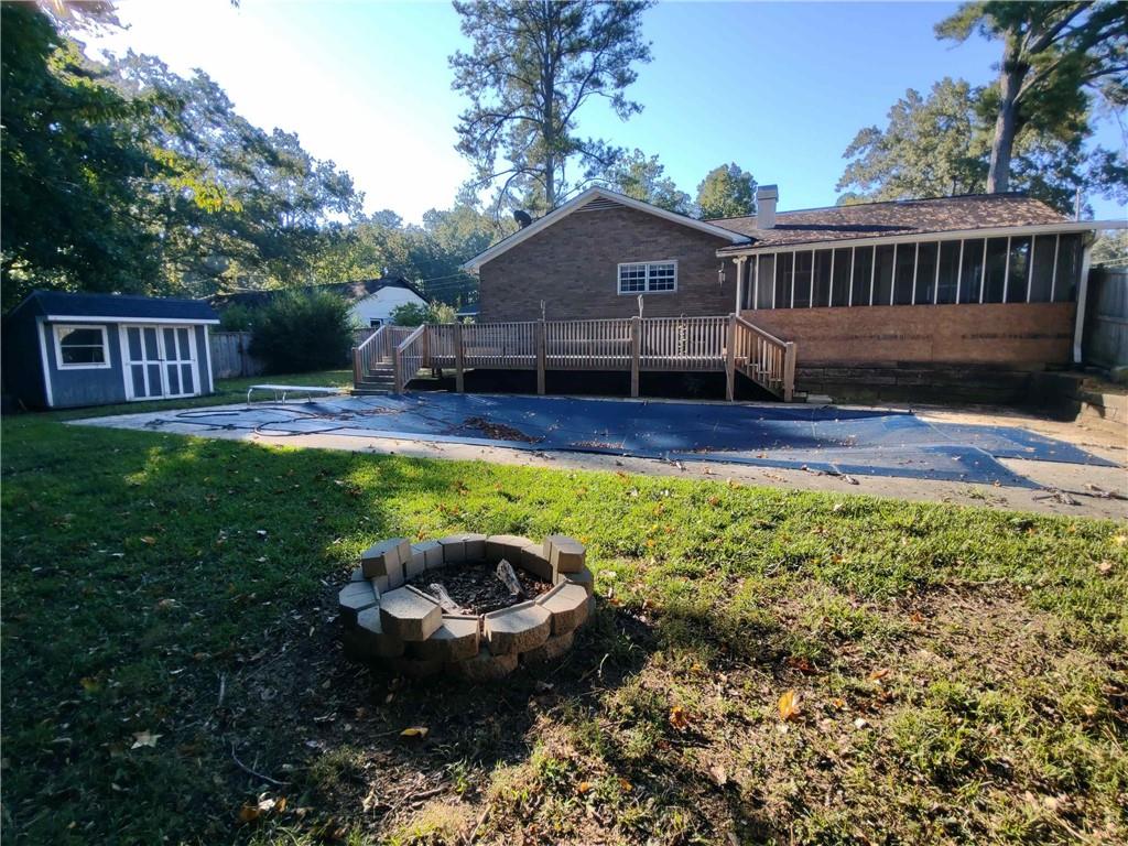 1 Westlyn Drive Rome, GA 30165 - Photo 24 of 26 a view of a house with backyard and sitting area
