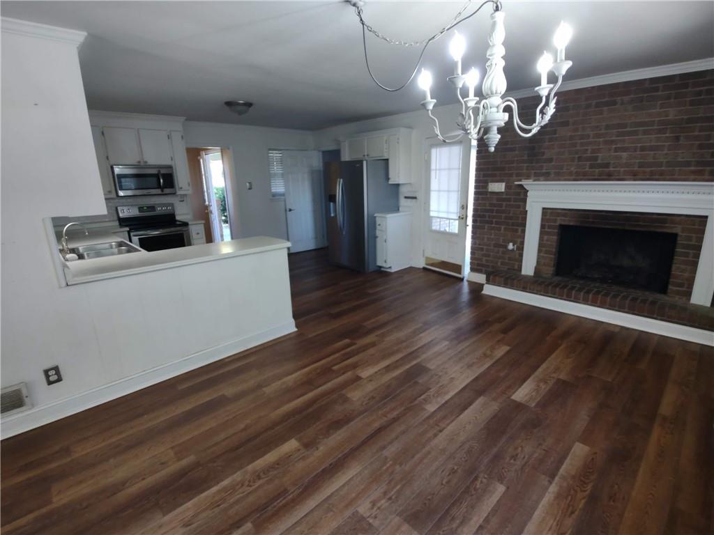 1 Westlyn Drive Rome, GA 30165 - Photo 8 of 26 a view of a livingroom with a fireplace