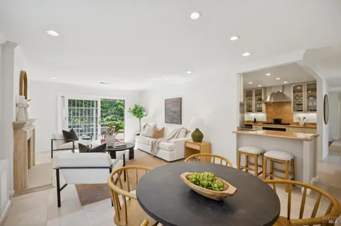a living room with furniture and a table