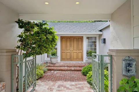 a front view of a house with a porch