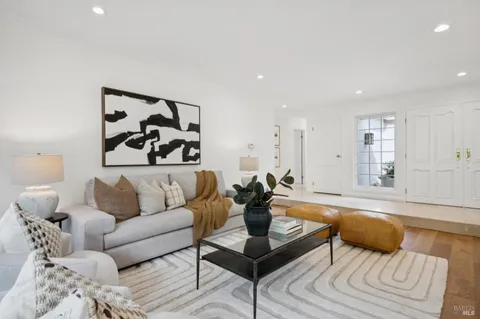 a living room with furniture and a couch