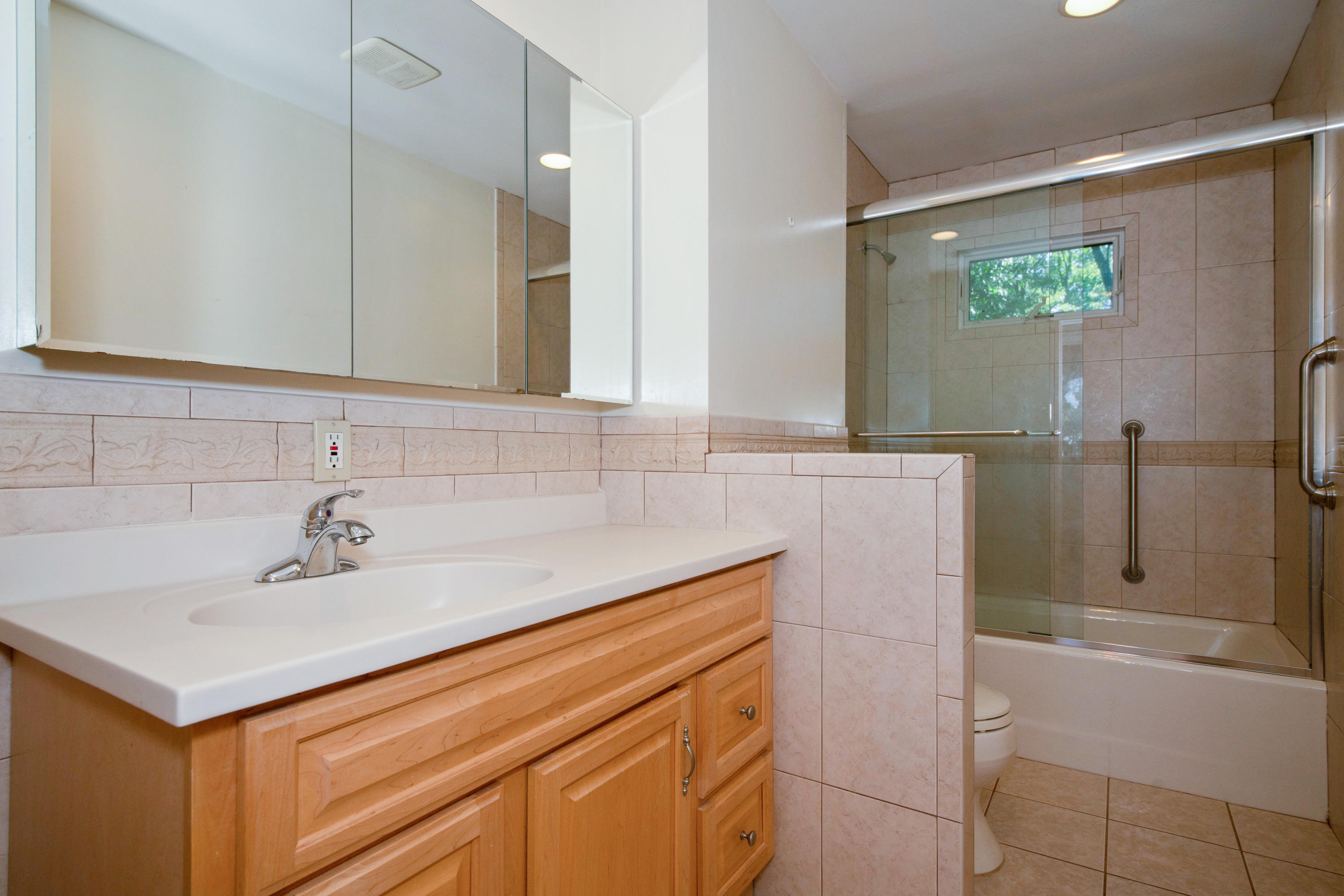 30 Splitrock Road Norwalk, CT 06854 - Photo 11 of 19 a bathroom with a sink and a mirror