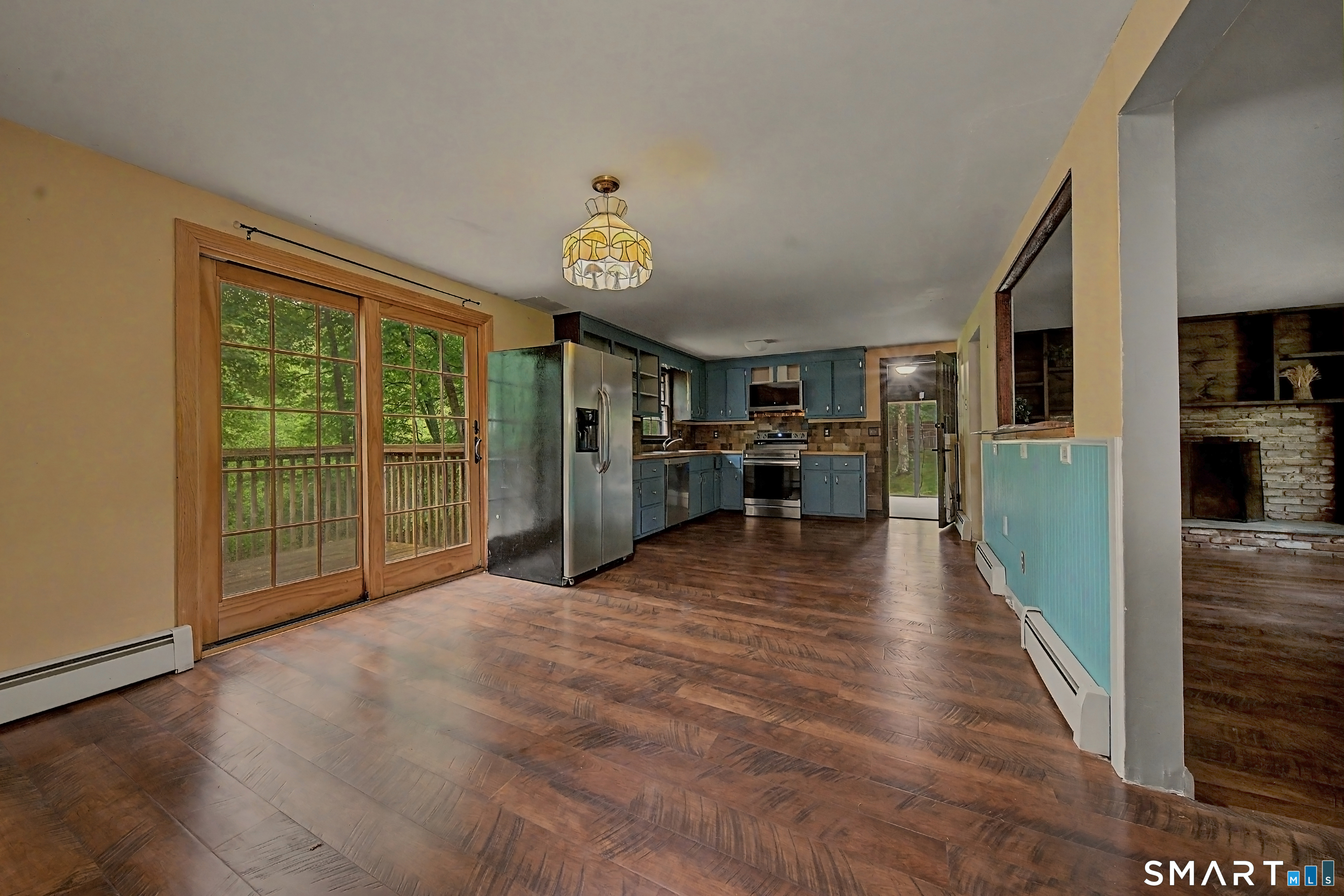 216 Reservoir Road Killingworth, CT 06419 - Photo 6 of 36 Eat-in kitchen with slider to deck.
