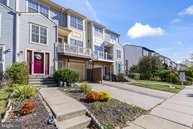 a view of a building with potted plants