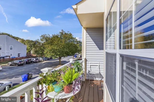 a view of a backyard with sitting area