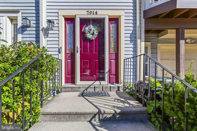 a view of front door with outdoor seating