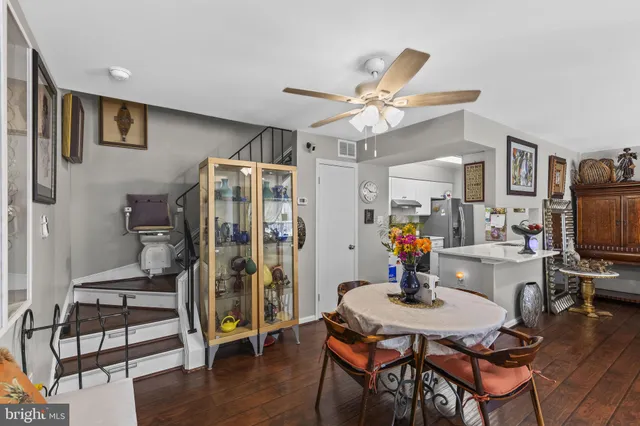 a view of a livingroom with furniture and a flat screen tv