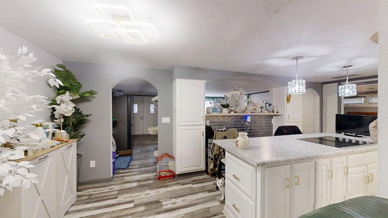 23 Greenridge Drive Decatur, IL 62526 - Photo 8 of 42 a kitchen that has a lot of cabinets a sink and a stove