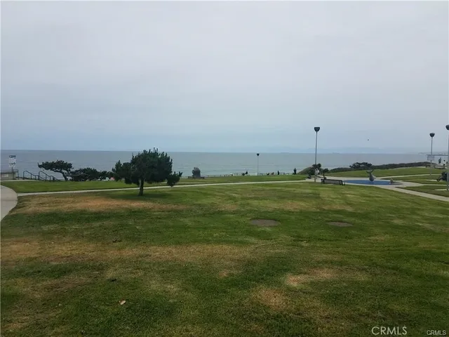 a view of swimming pool from a balcony