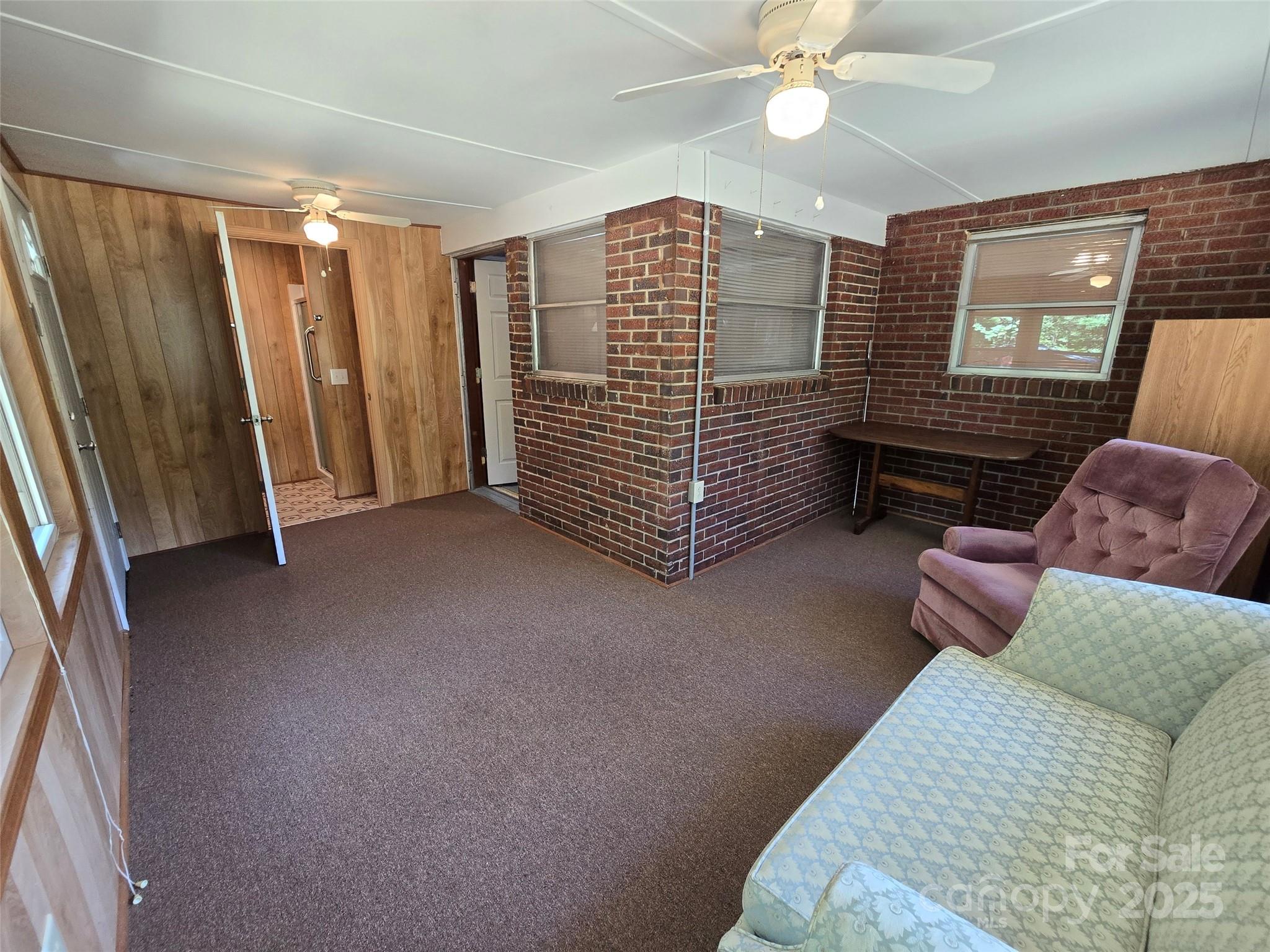 517 Mask Road Mount Gilead, NC 27306 - Photo 28 of 48 a view of livingroom with furniture and a ceiling fan