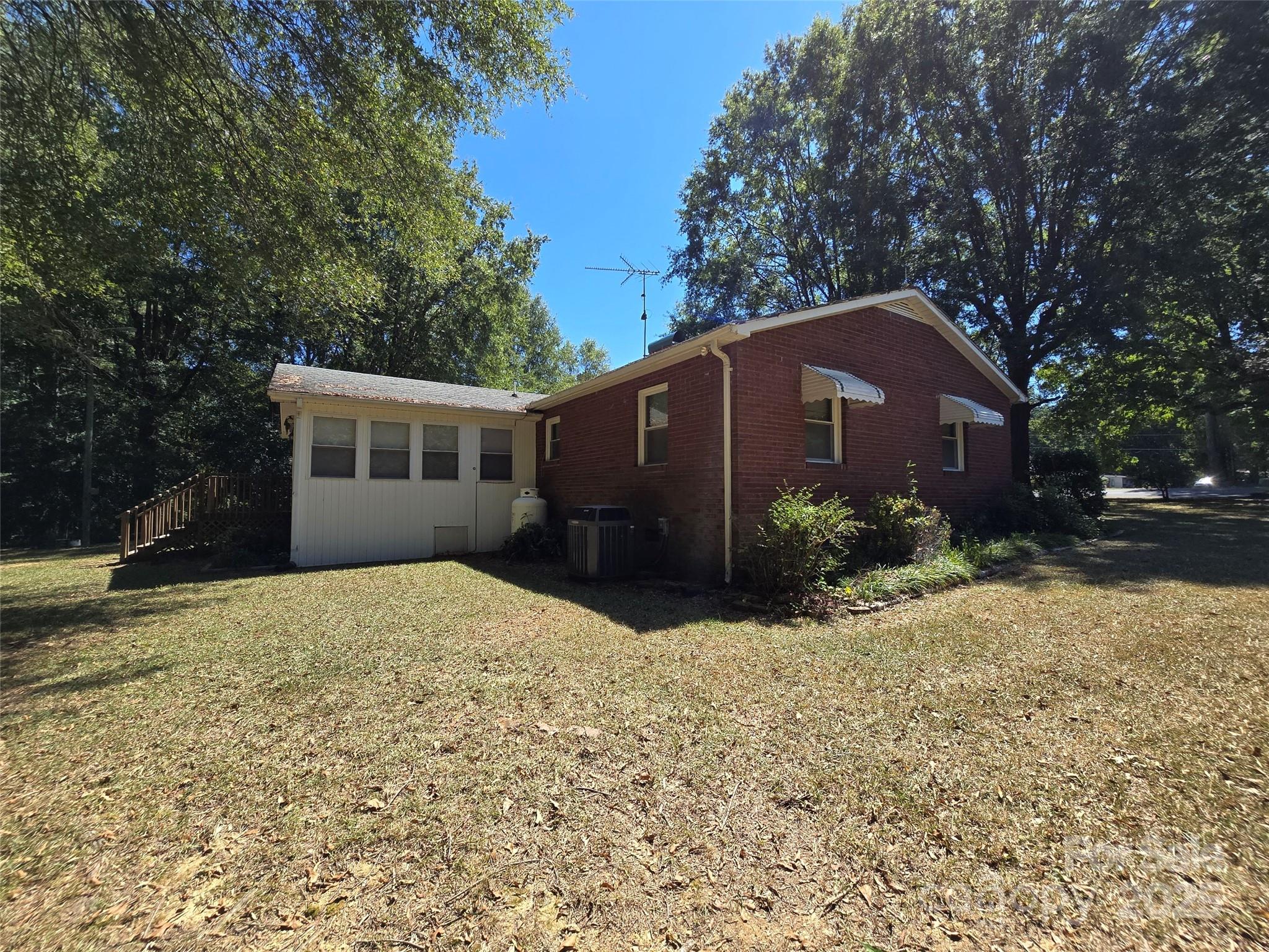 517 Mask Road Mount Gilead, NC 27306 - Photo 36 of 48 a front view of a house with a yard