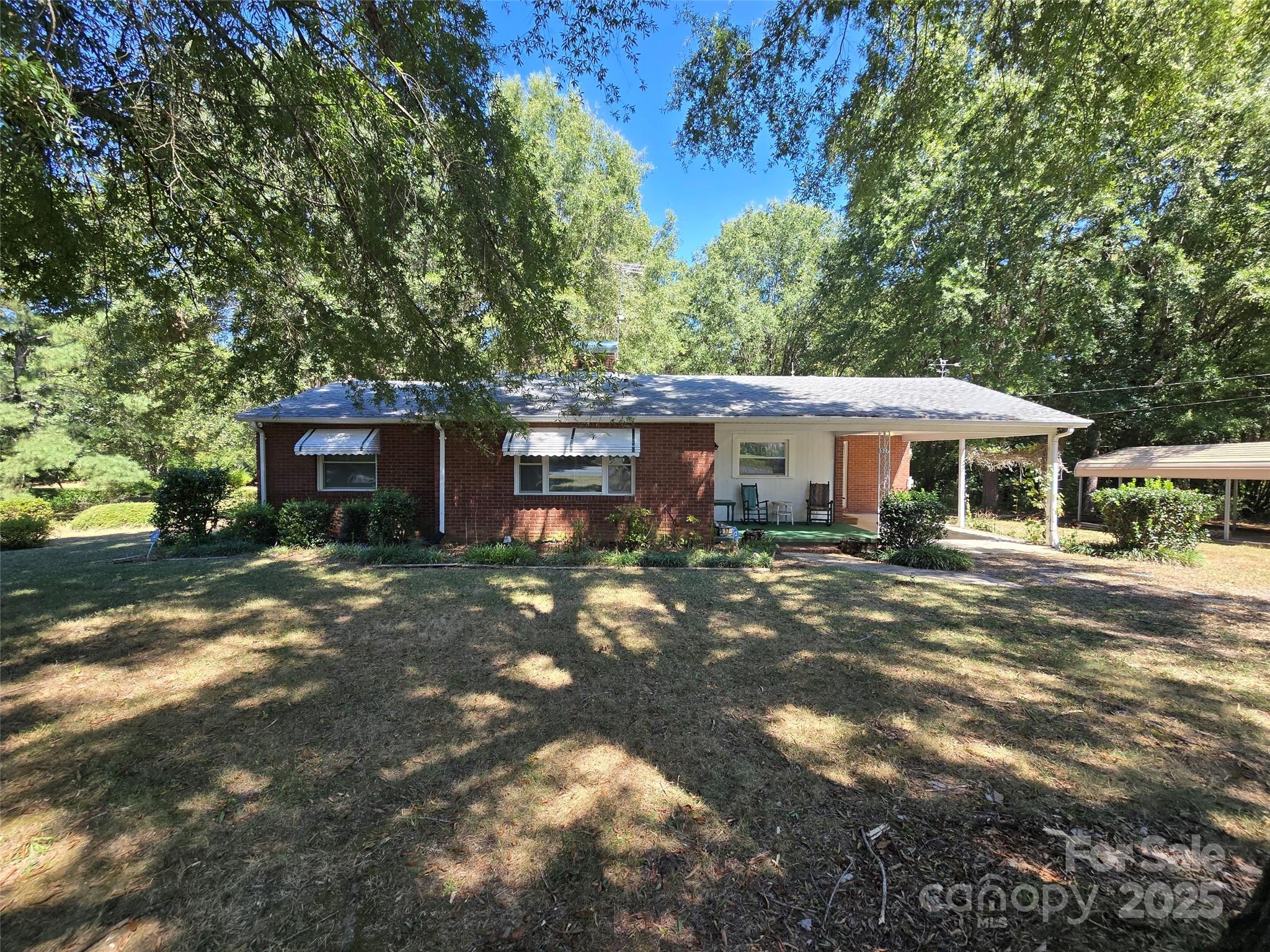 517 Mask Road Mount Gilead, NC 27306 - Photo 37 of 48 a front view of a house with a yard