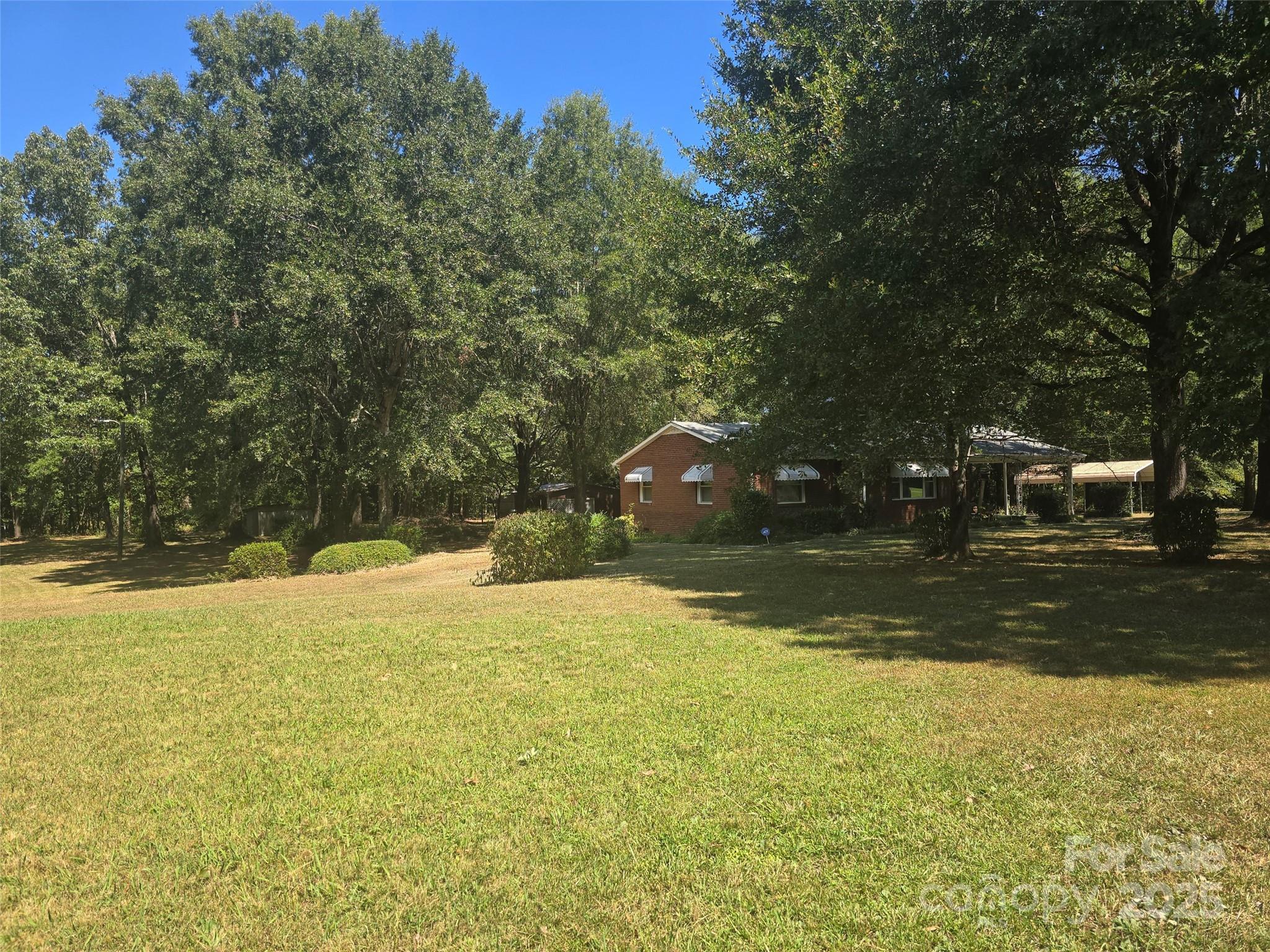 517 Mask Road Mount Gilead, NC 27306 - Photo 45 of 48 a view of a yard with a house