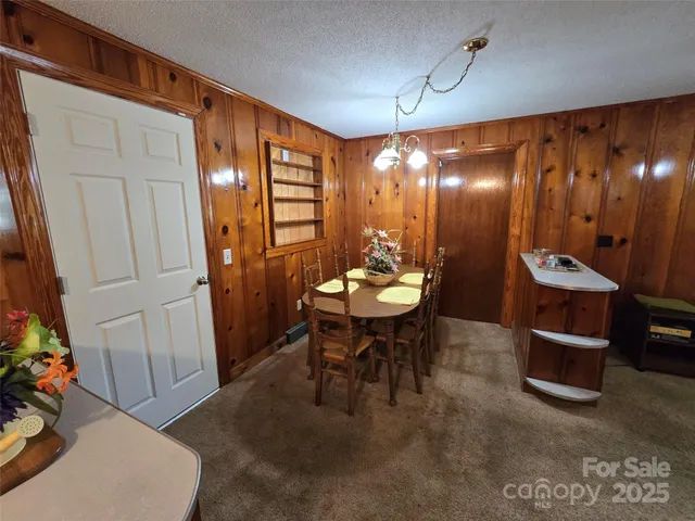 a view of a livingroom with furniture and window