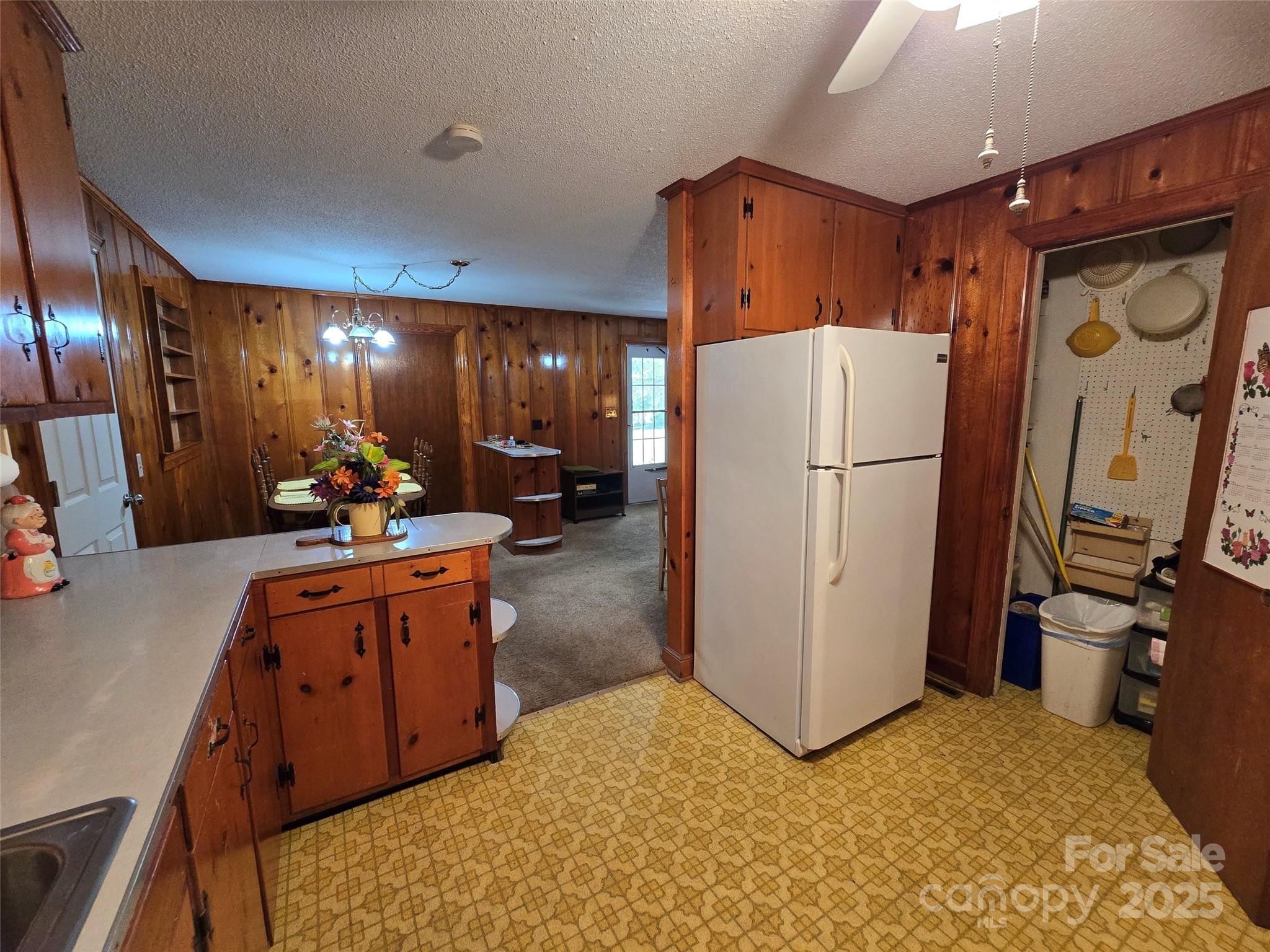 517 Mask Road Mount Gilead, NC 27306 - Photo 10 of 48 a open kitchen with stainless steel appliances granite countertop a refrigerator a oven a sink and a refrigerator