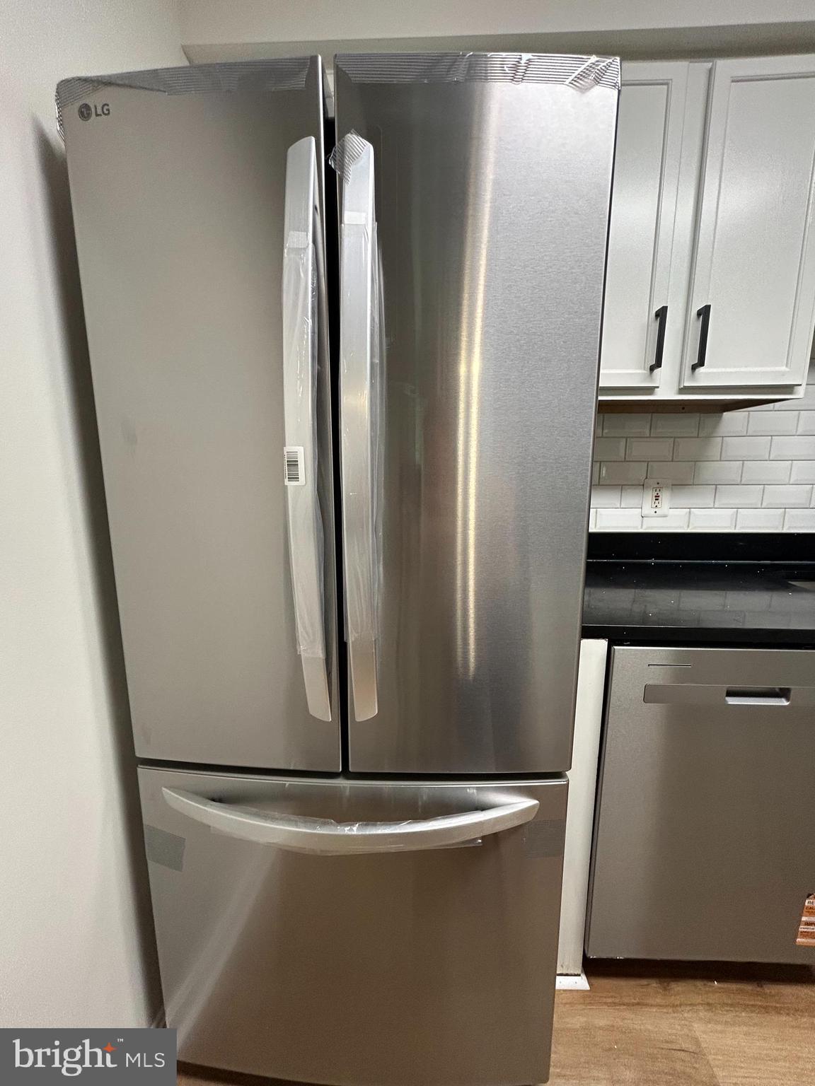 635 Waterloo Road, Unit 222 Warrenton, VA 20186 - Photo 17 of 28 a view of a refrigerator in kitchen