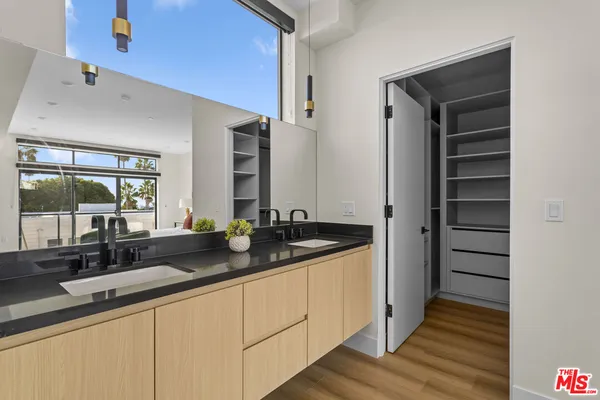 a bathroom with a shower and toilet